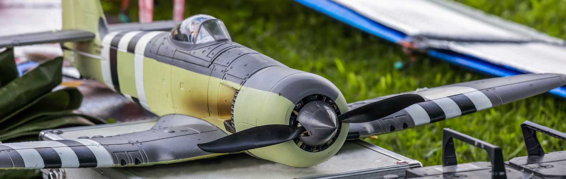A model aeroplane sitting on the grass